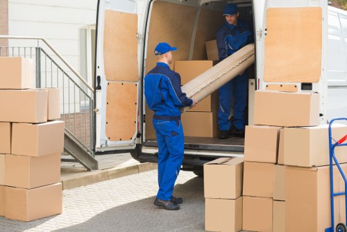 Moving van and boxes prepared for a Queenspark service booking