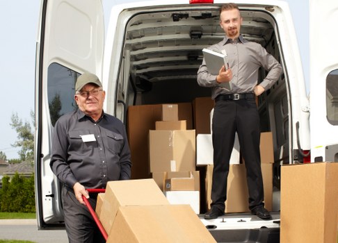 Removal van ready for a residential move in Queens Park