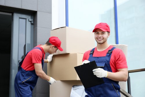 Man with van loading boxes for a Queenspark move