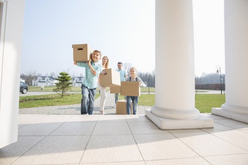 Office removals team planning a move in Queens Park