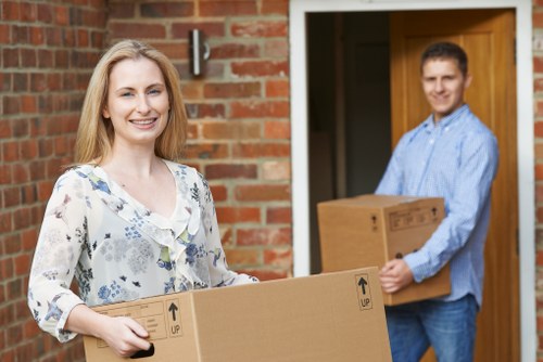 Queens Park home move with boxes, furniture, and a van ready for transport