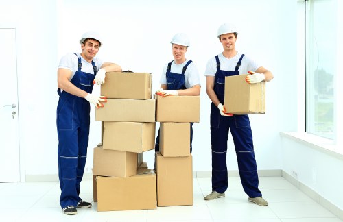 Queens Park household moving service with boxes and furniture
