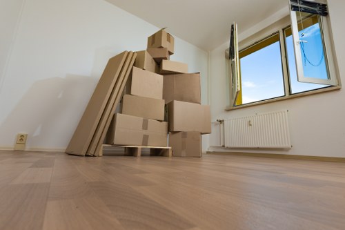 Packed business items ready for transport during a Queens Park relocation