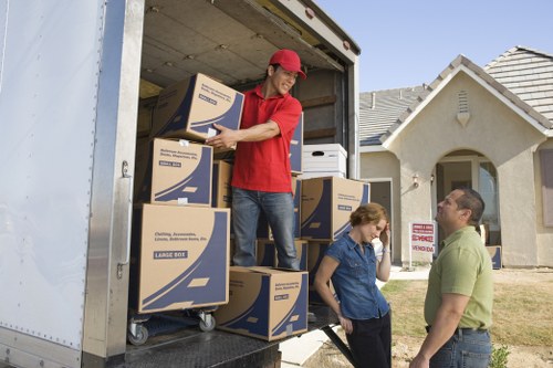 Moving crew handling office relocation access and loading logistics