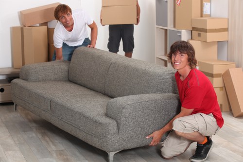 Team collecting bulky furniture from a Queens Park flat