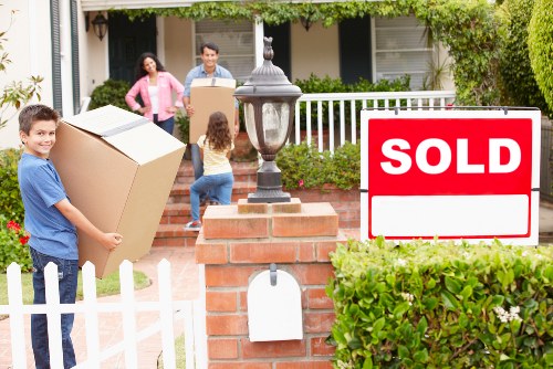Local moving crew planning a house move in Queens Park