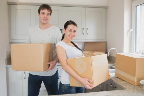 Packed household items ready for a local Queens Park move